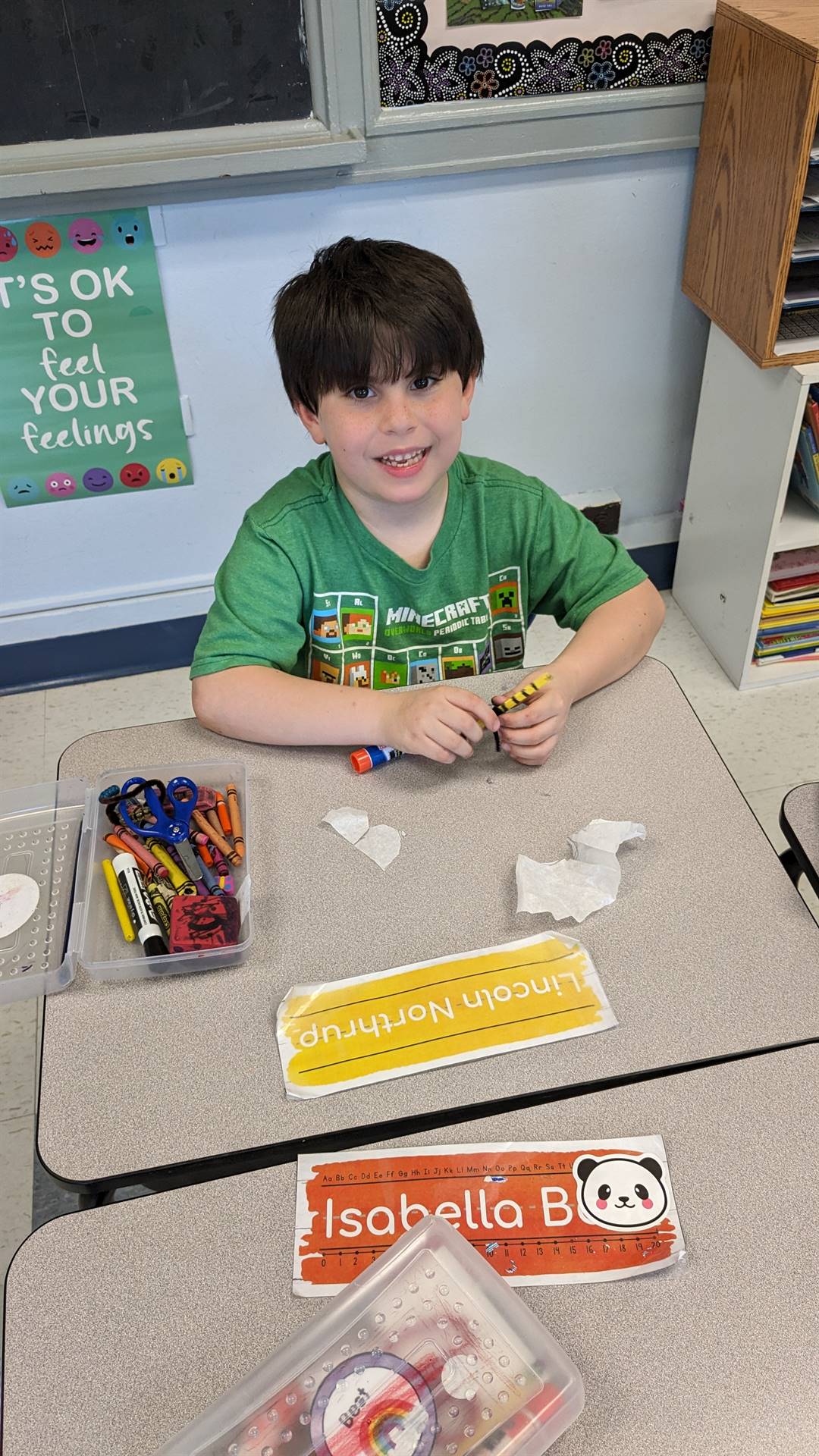 student sitting at desk. 