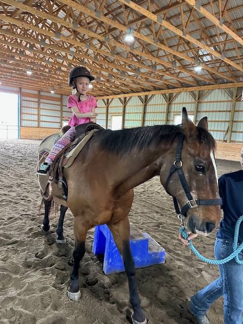 student on a horse 