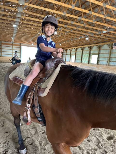 student on a horse 