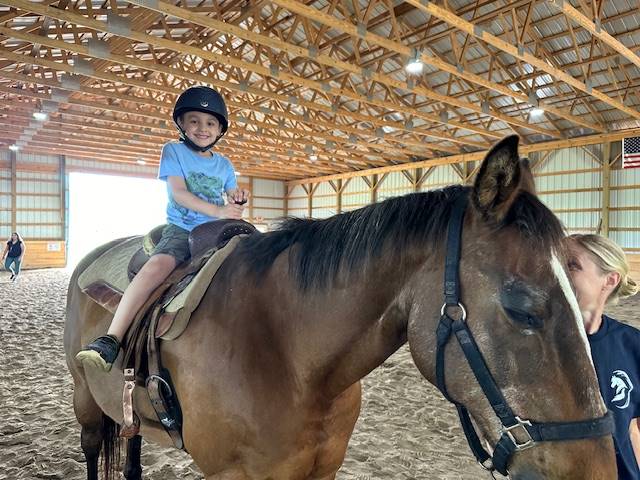 student on a horse 