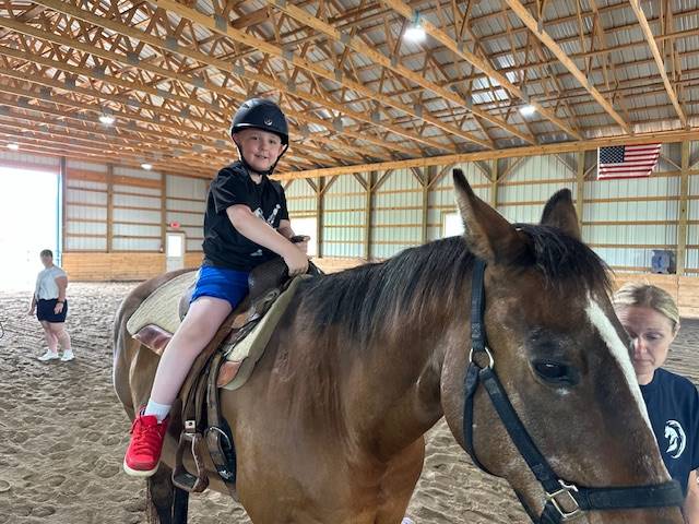 student on a horse 