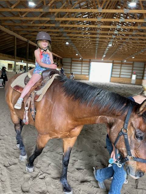 student on a horse 