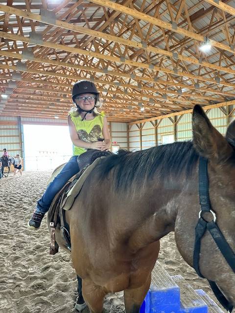 student on a horse 