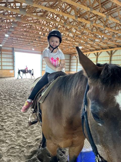 student on a horse 