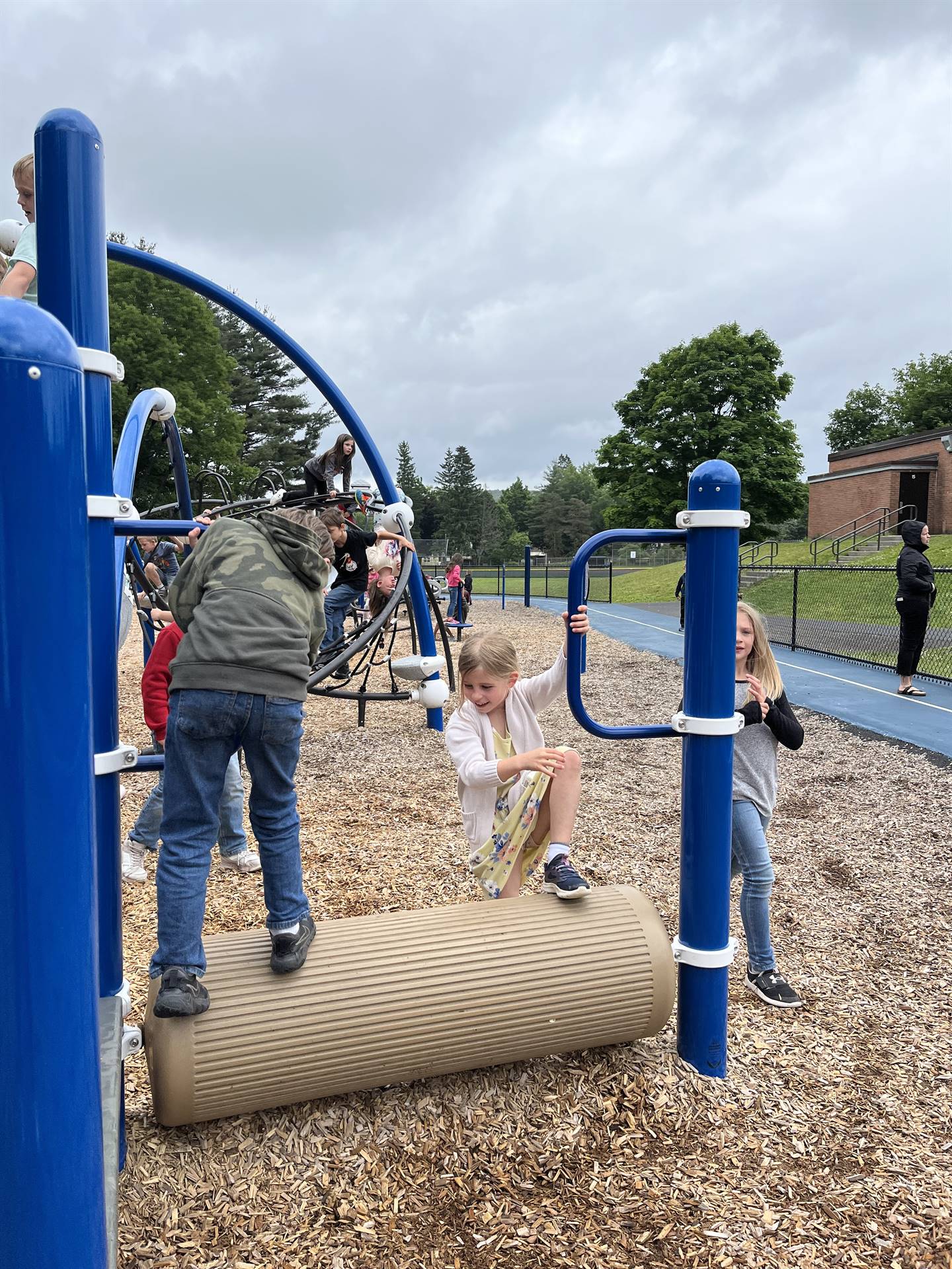 students on playground equipment
