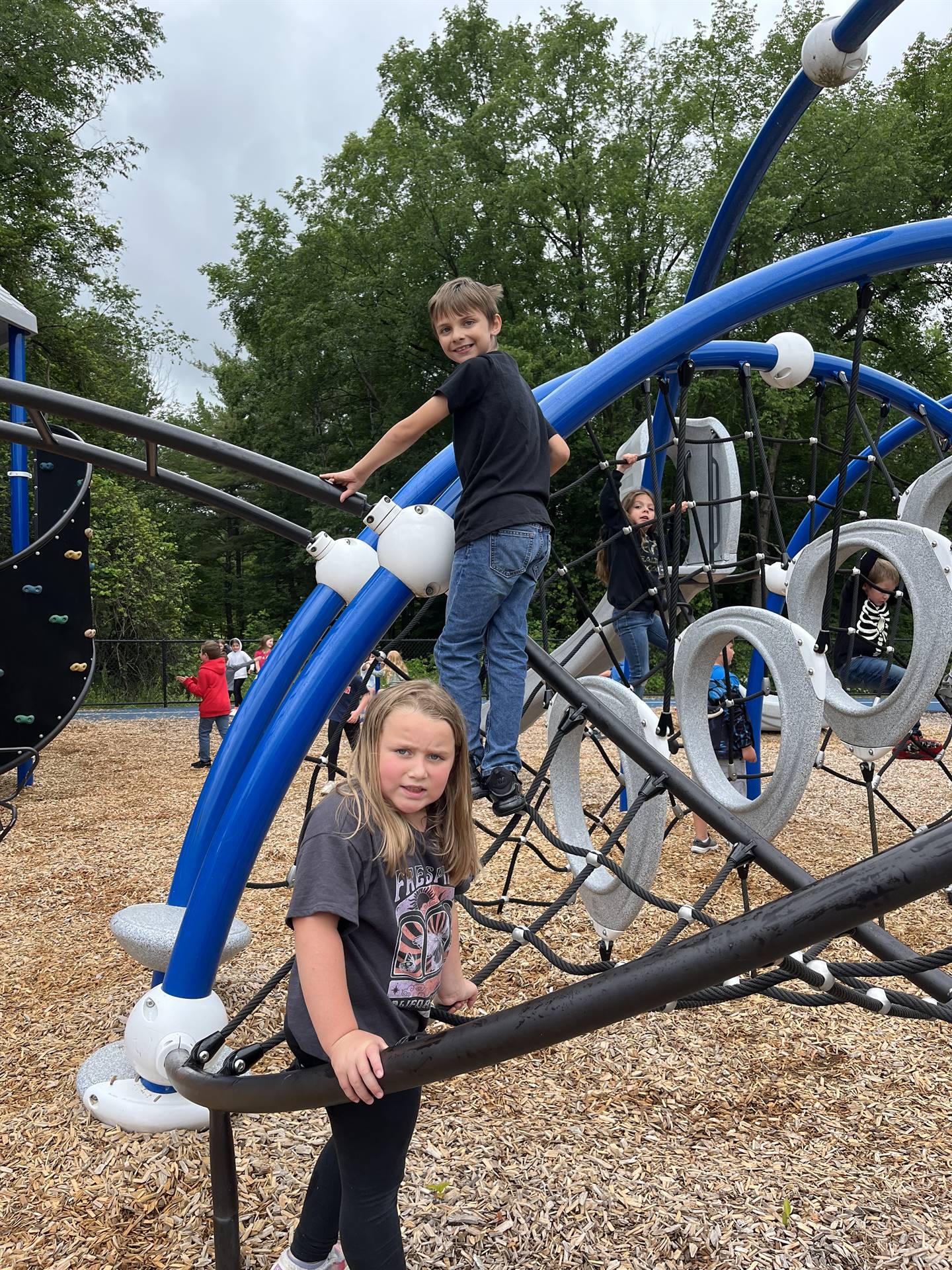 students on playground equipment