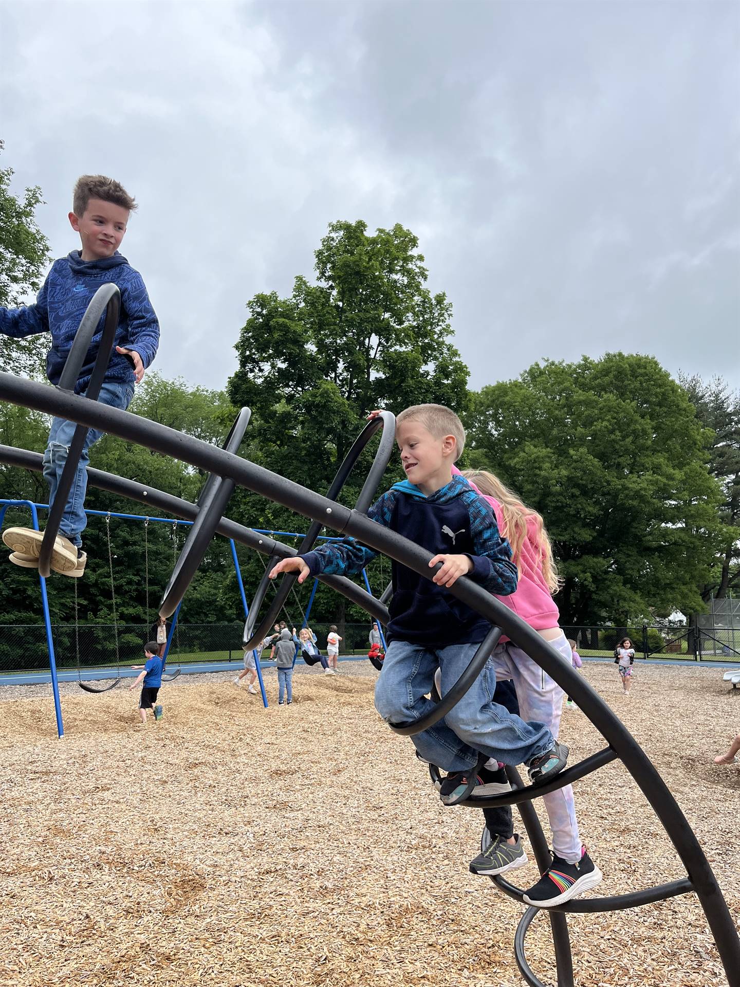 students on playground equipment