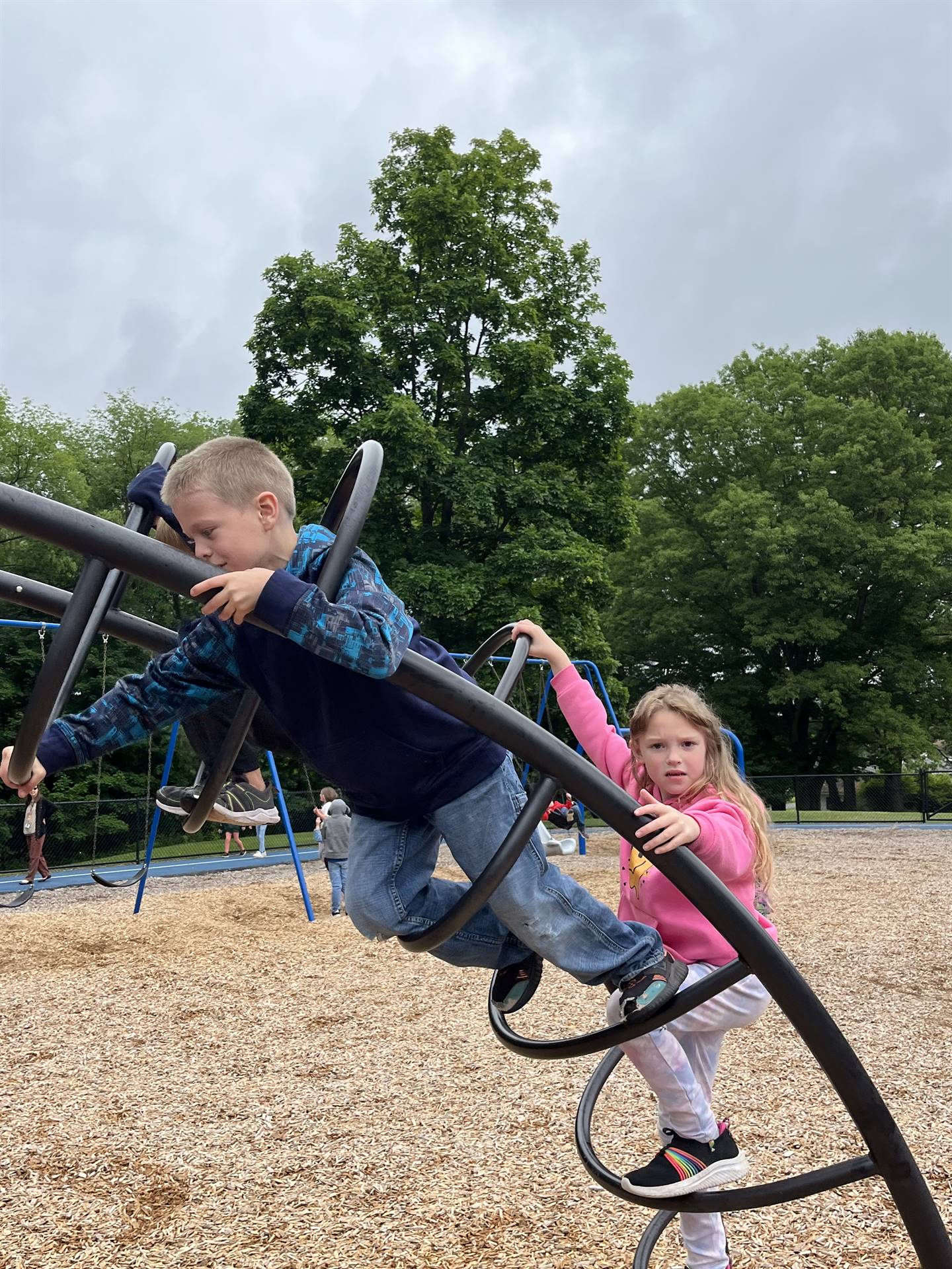 students on playground equipment