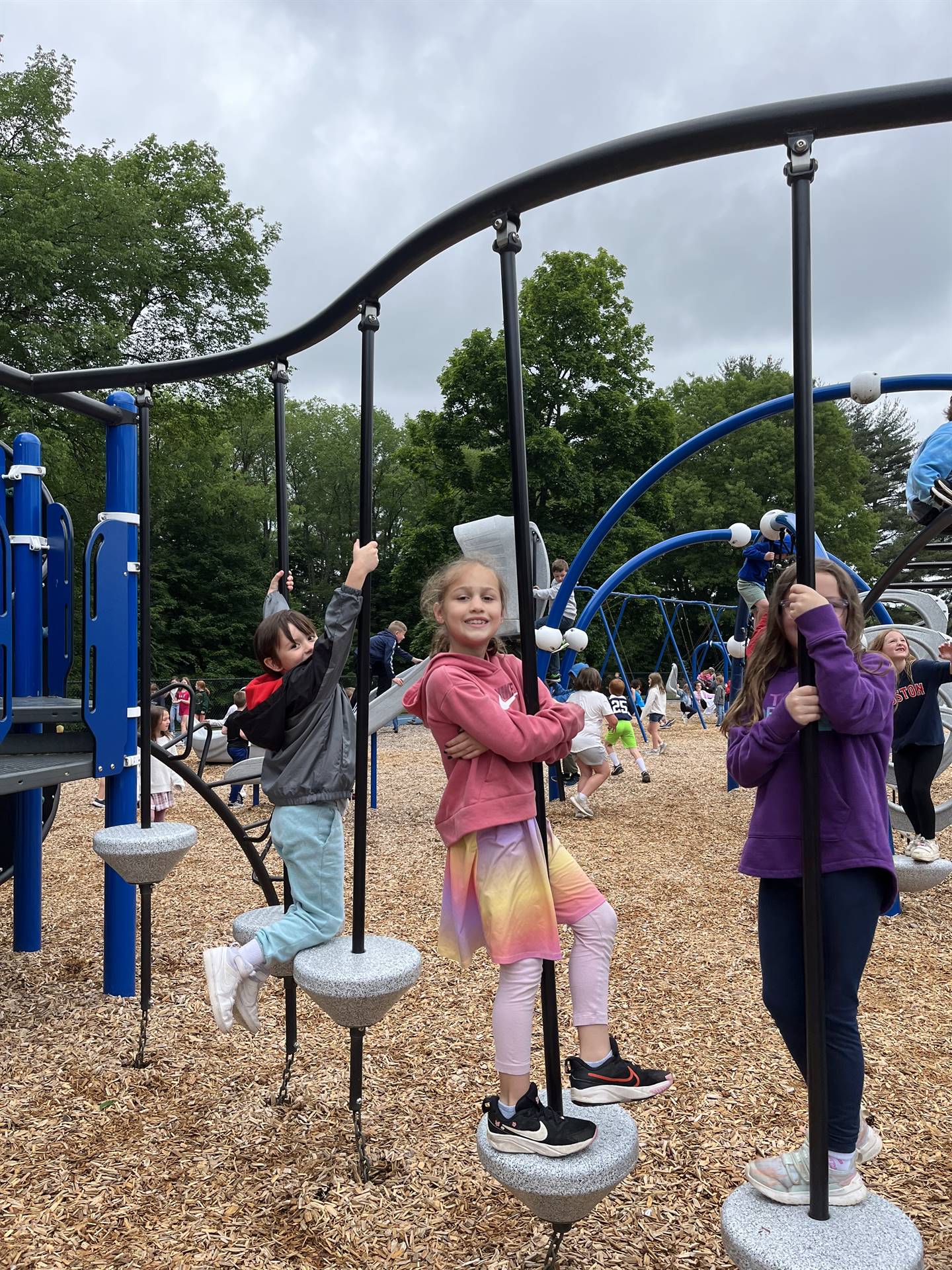 students on playground equipment
