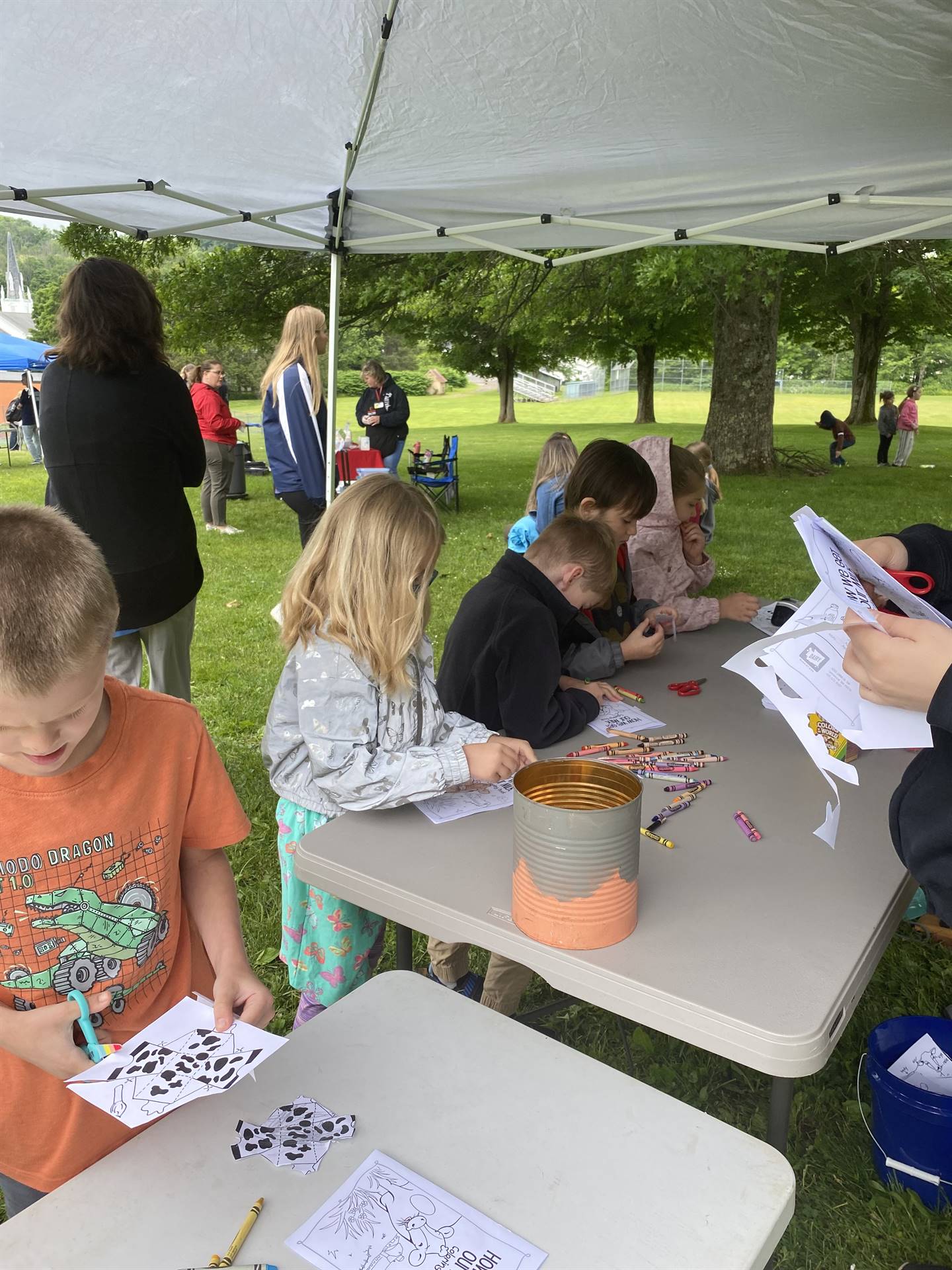 student coloring and making crafts for dairy day