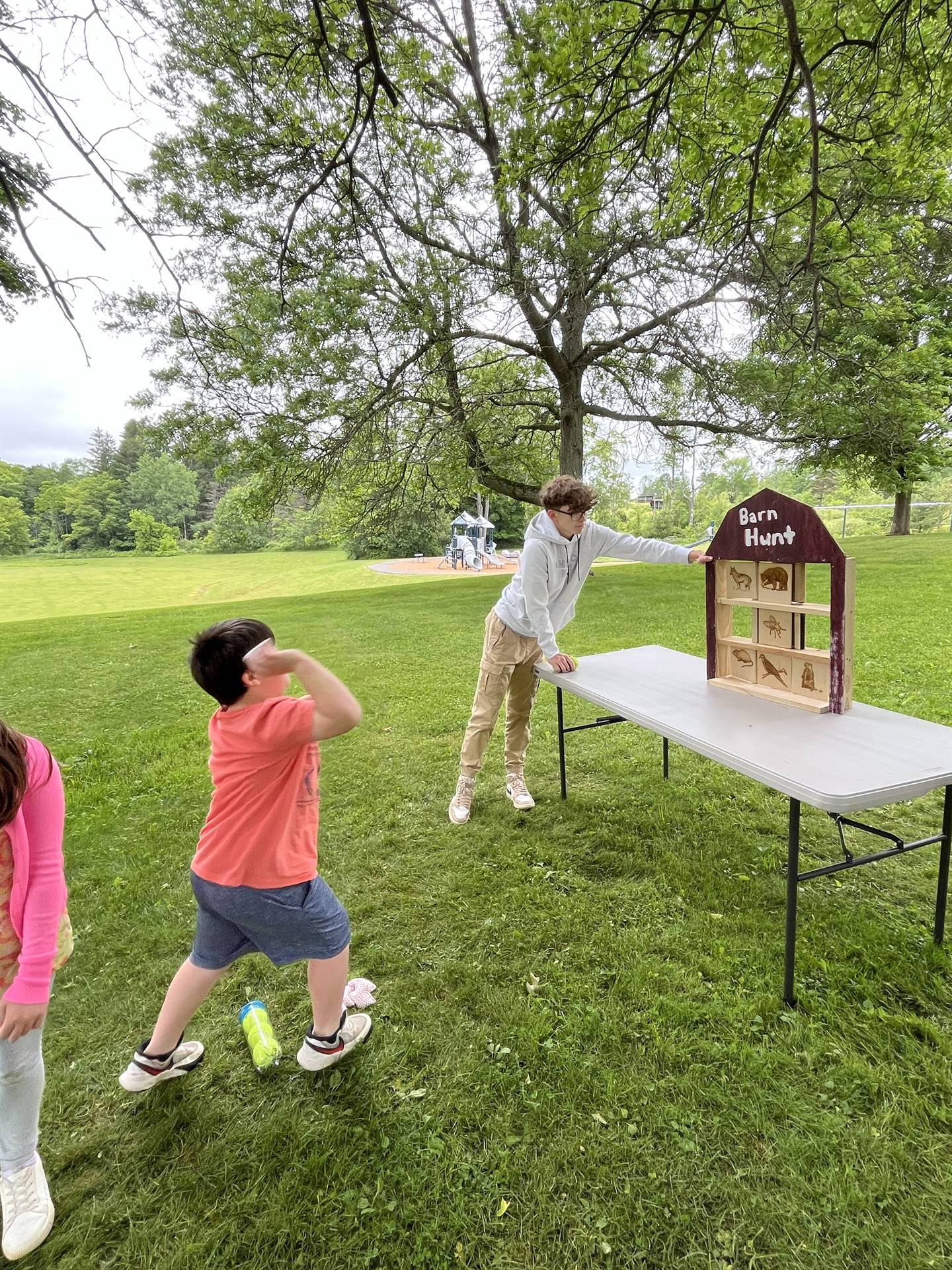 student throwing a ball for  a game.