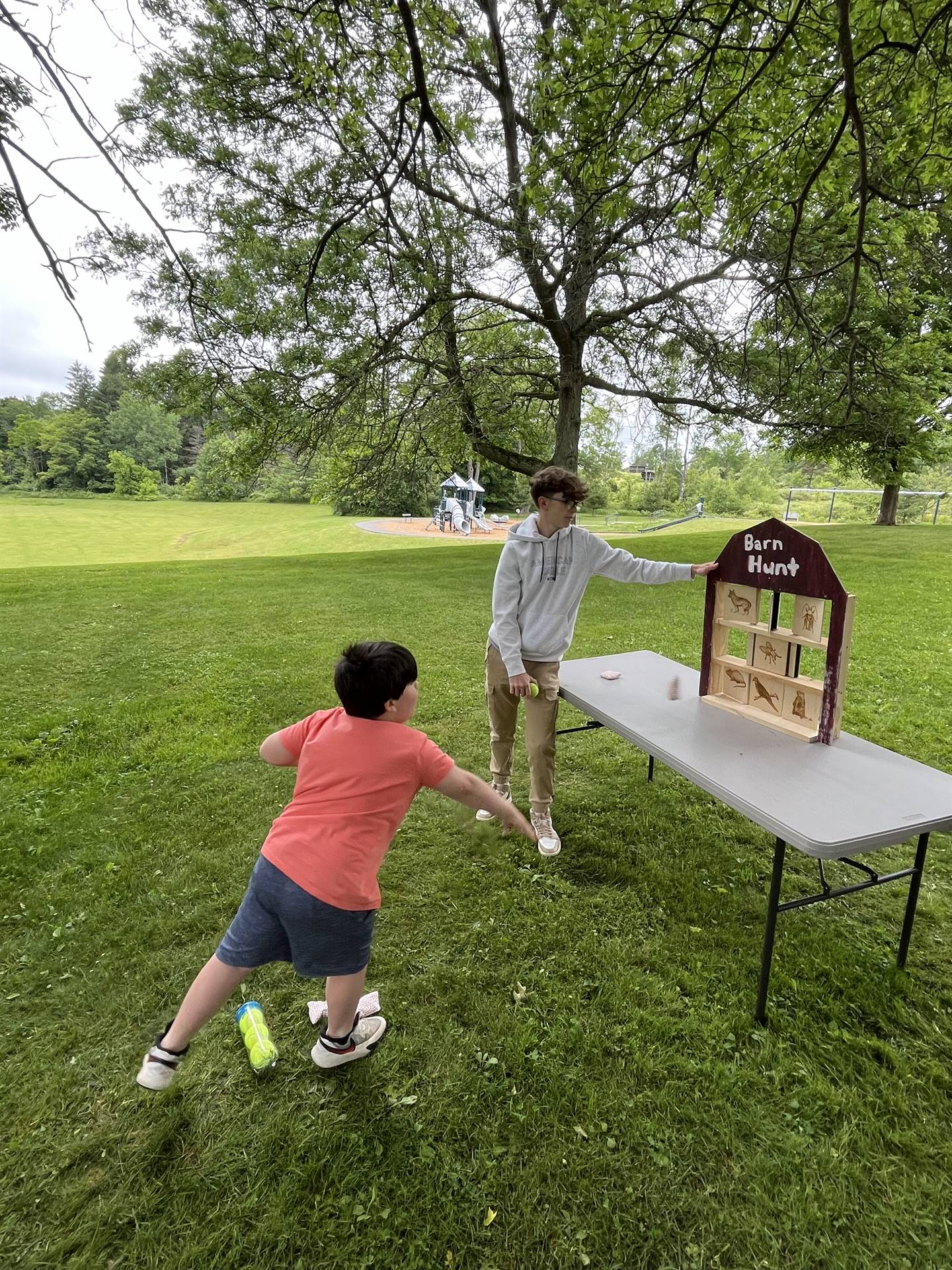 student throwing a ball for  a game.