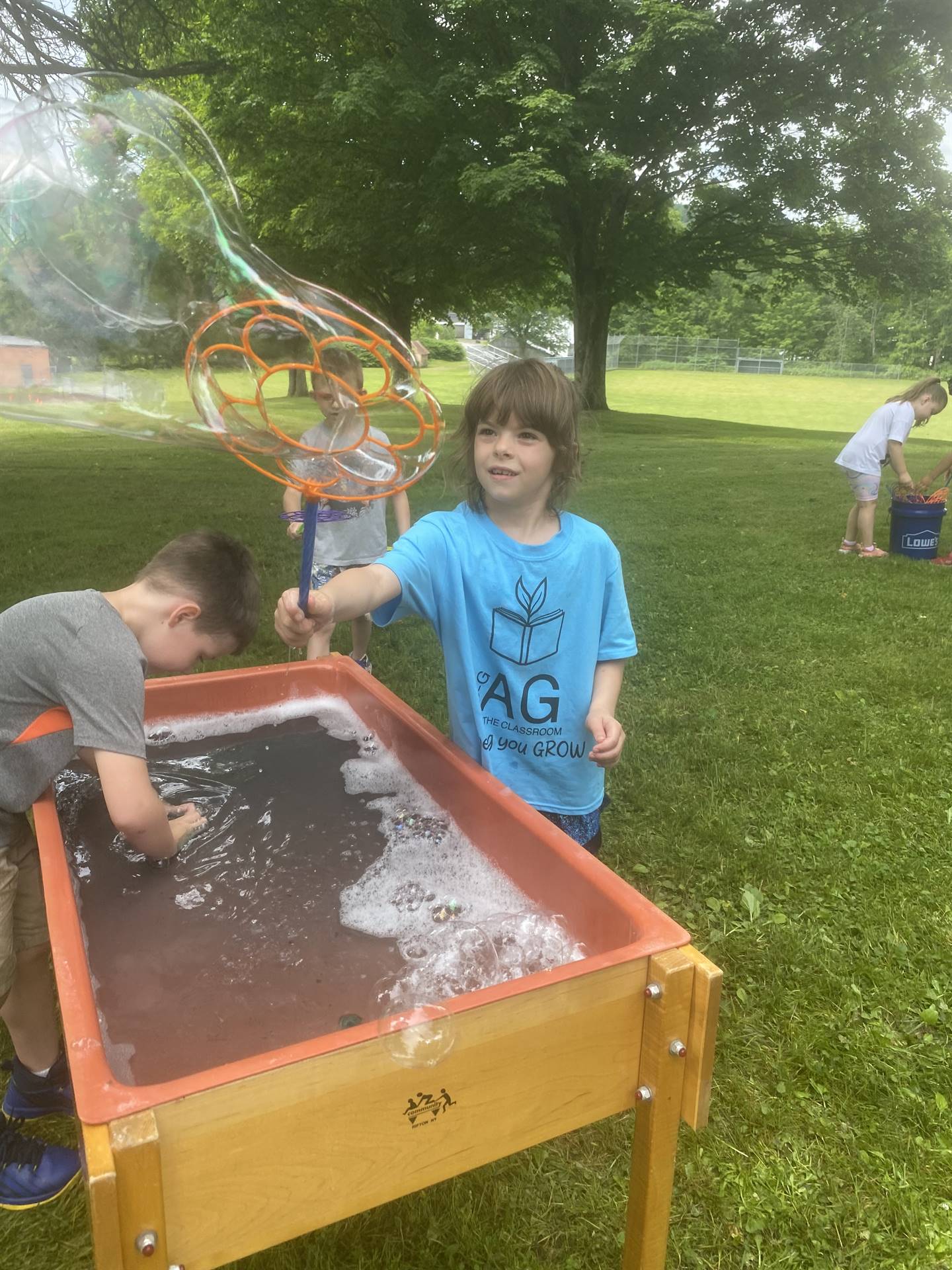 students at bubble table