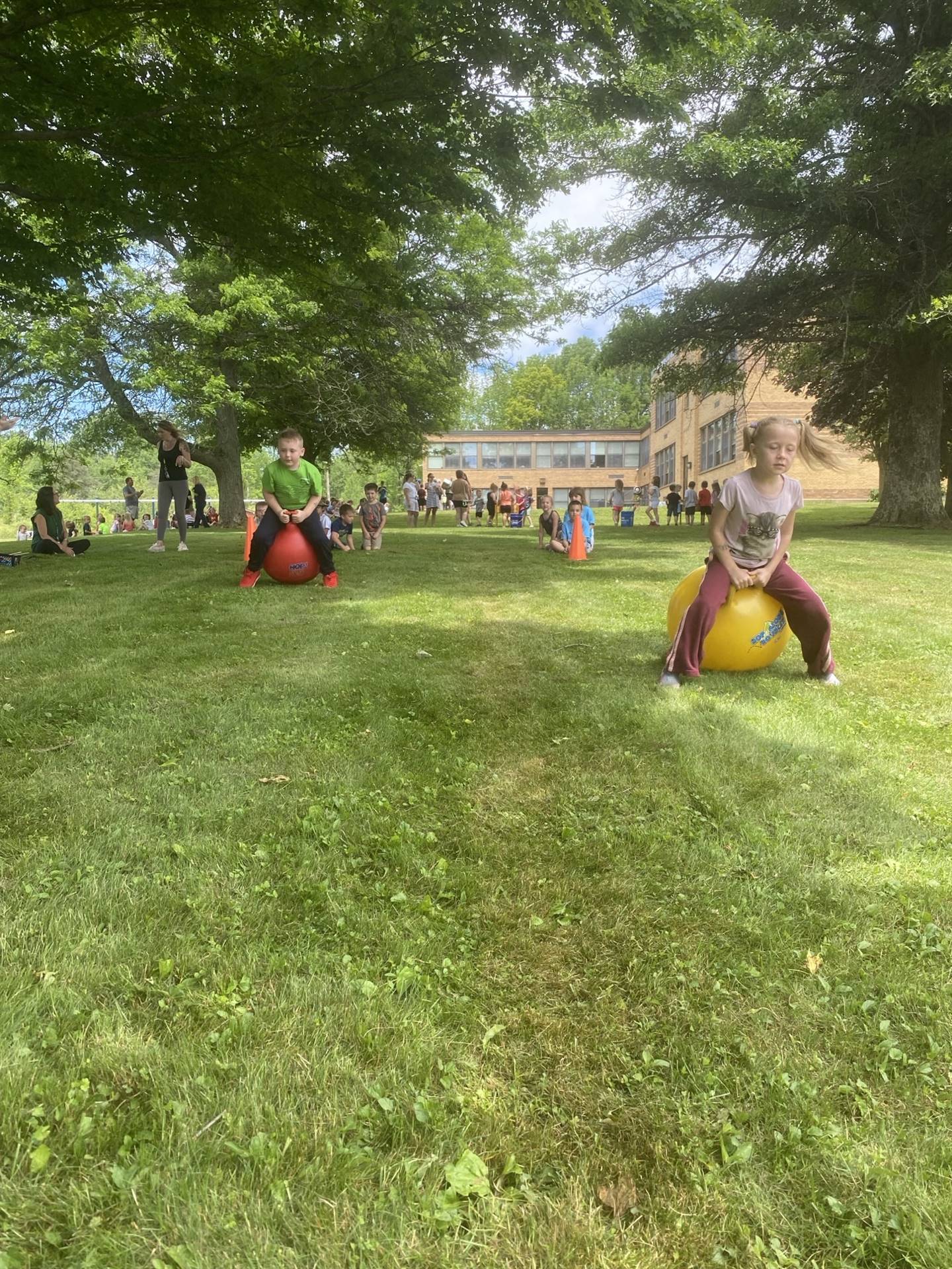 students on hop balls