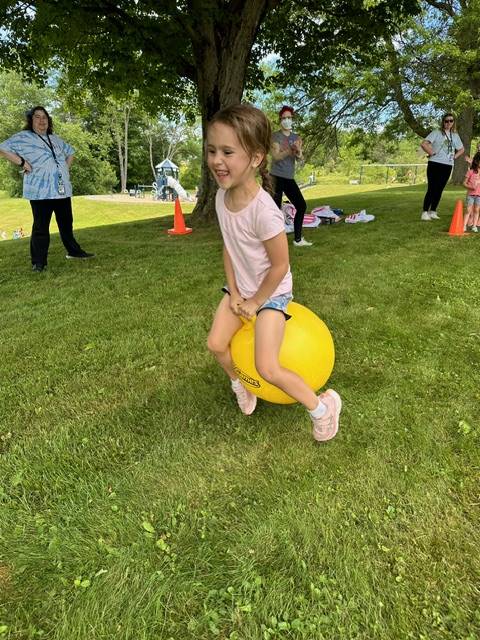 student on bouncy ball