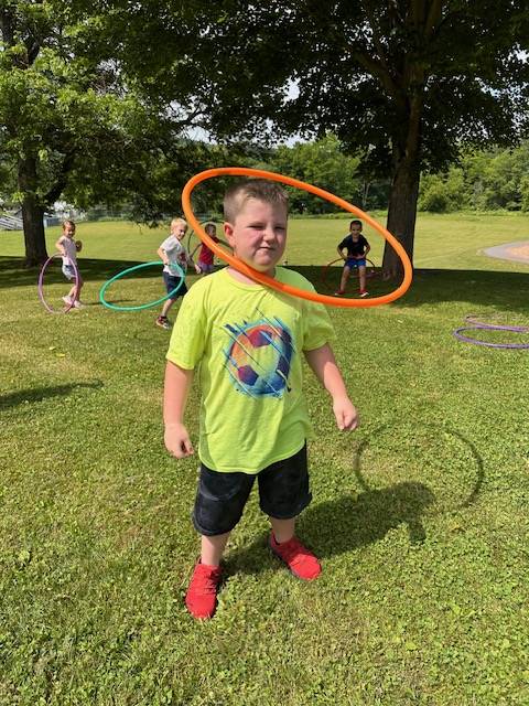 student with hula hoop