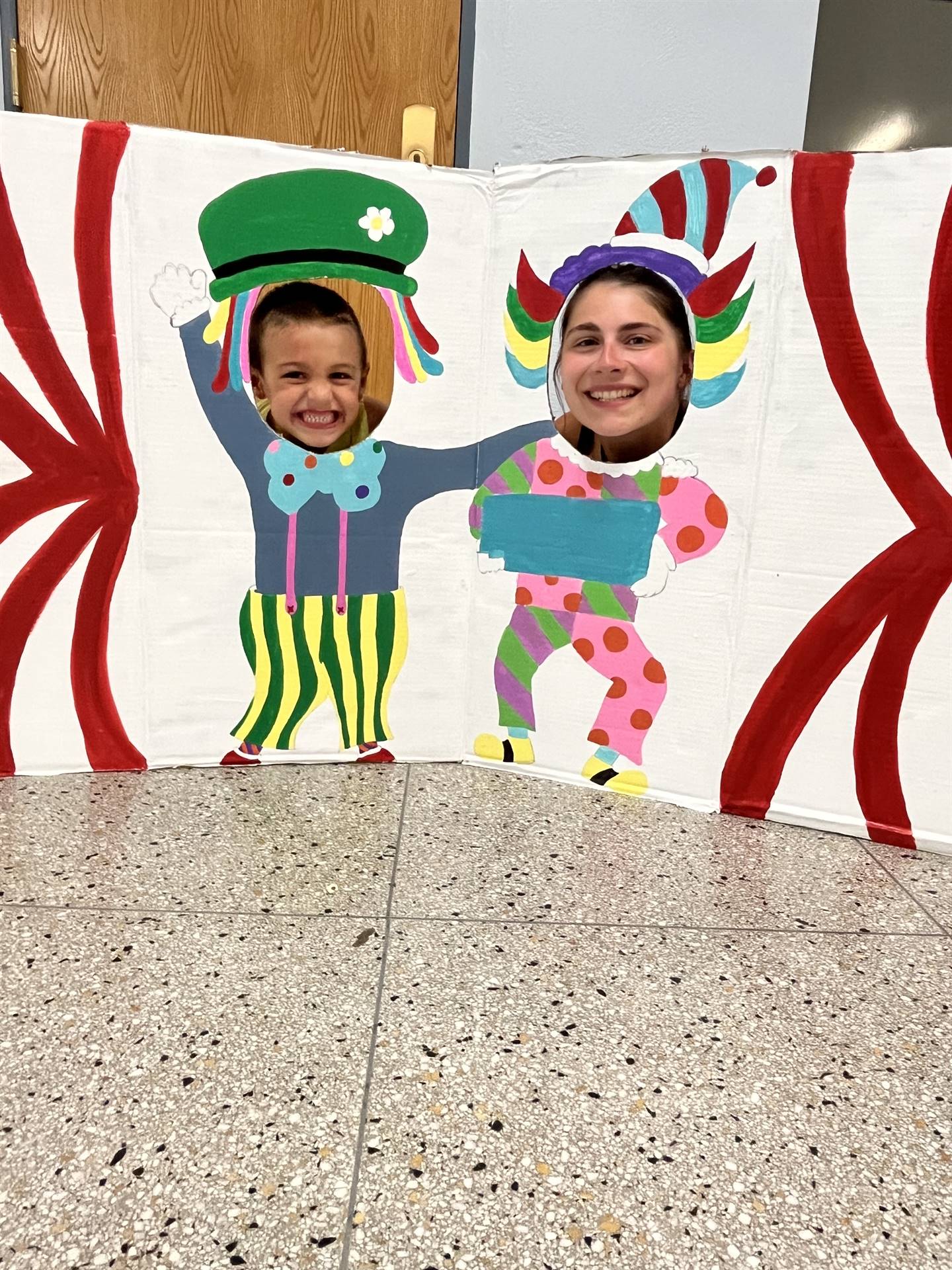 Photo booth clowns with 2 student faces