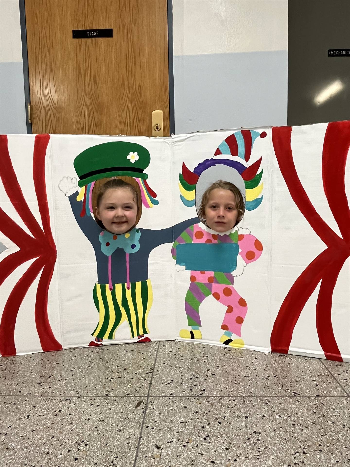 Photo booth clowns with 2 student faces