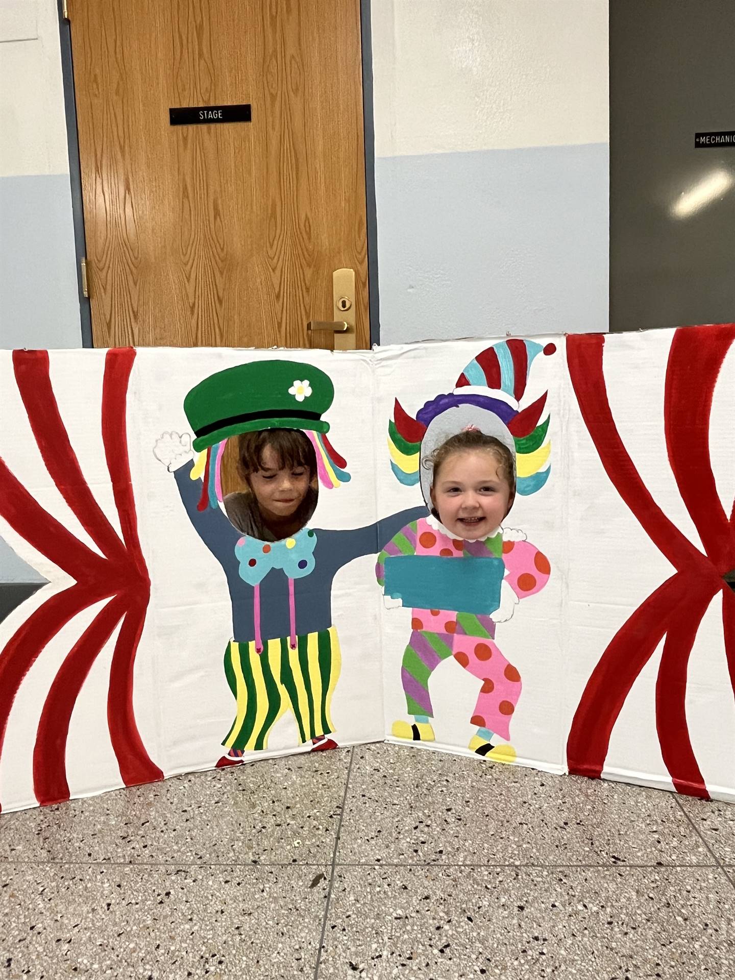 Photo booth clowns with 2 student faces