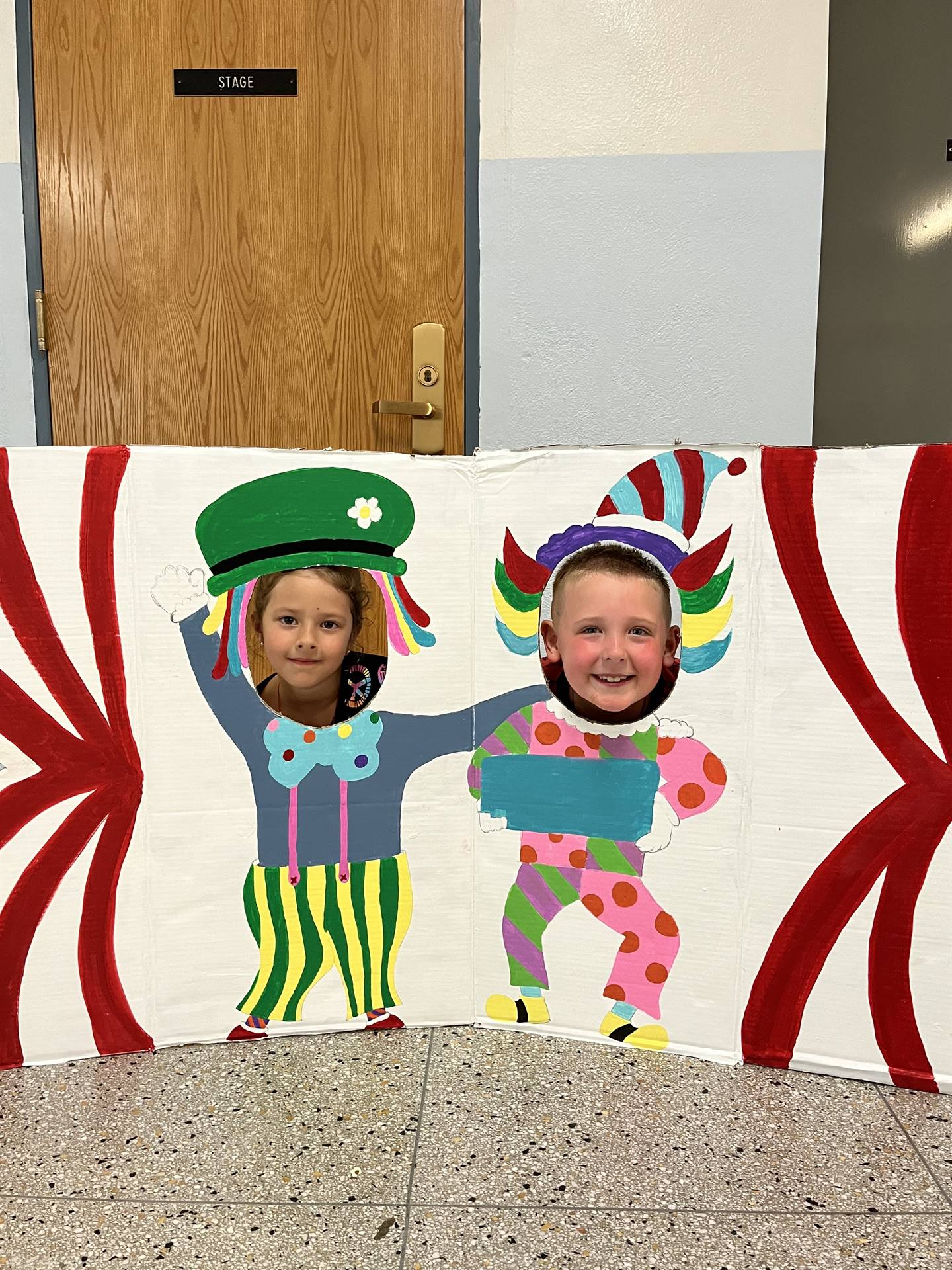 Photo booth clowns with 2 student faces