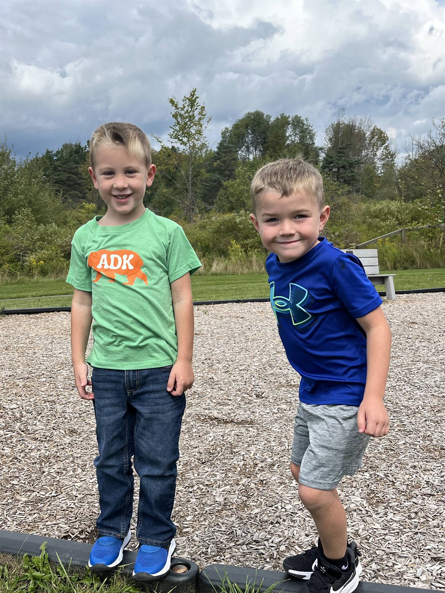 2 students standing outdoors