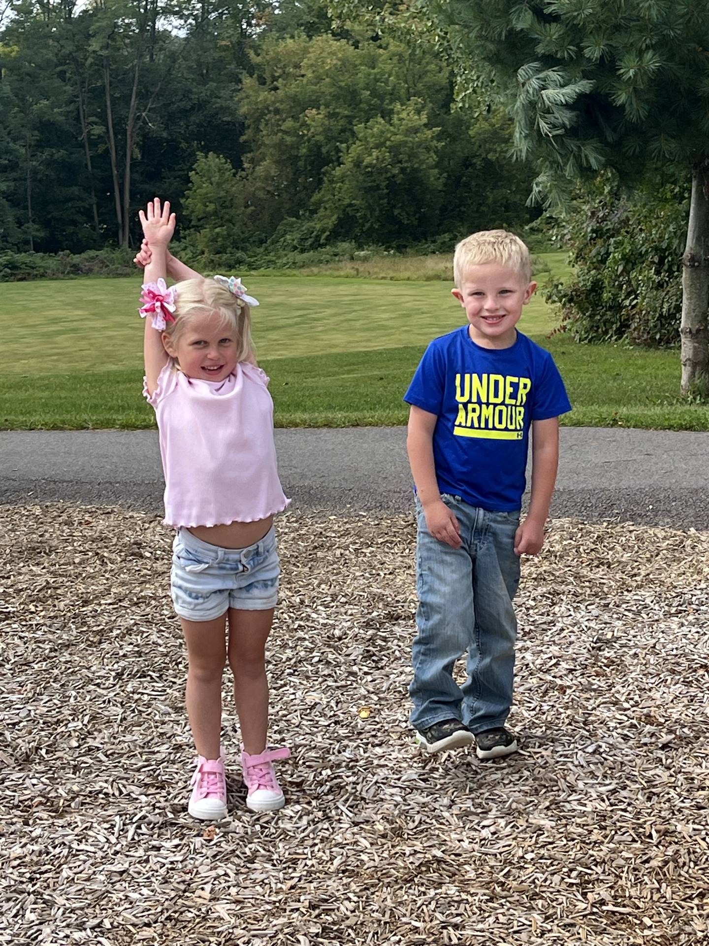 2 students standing outdoors