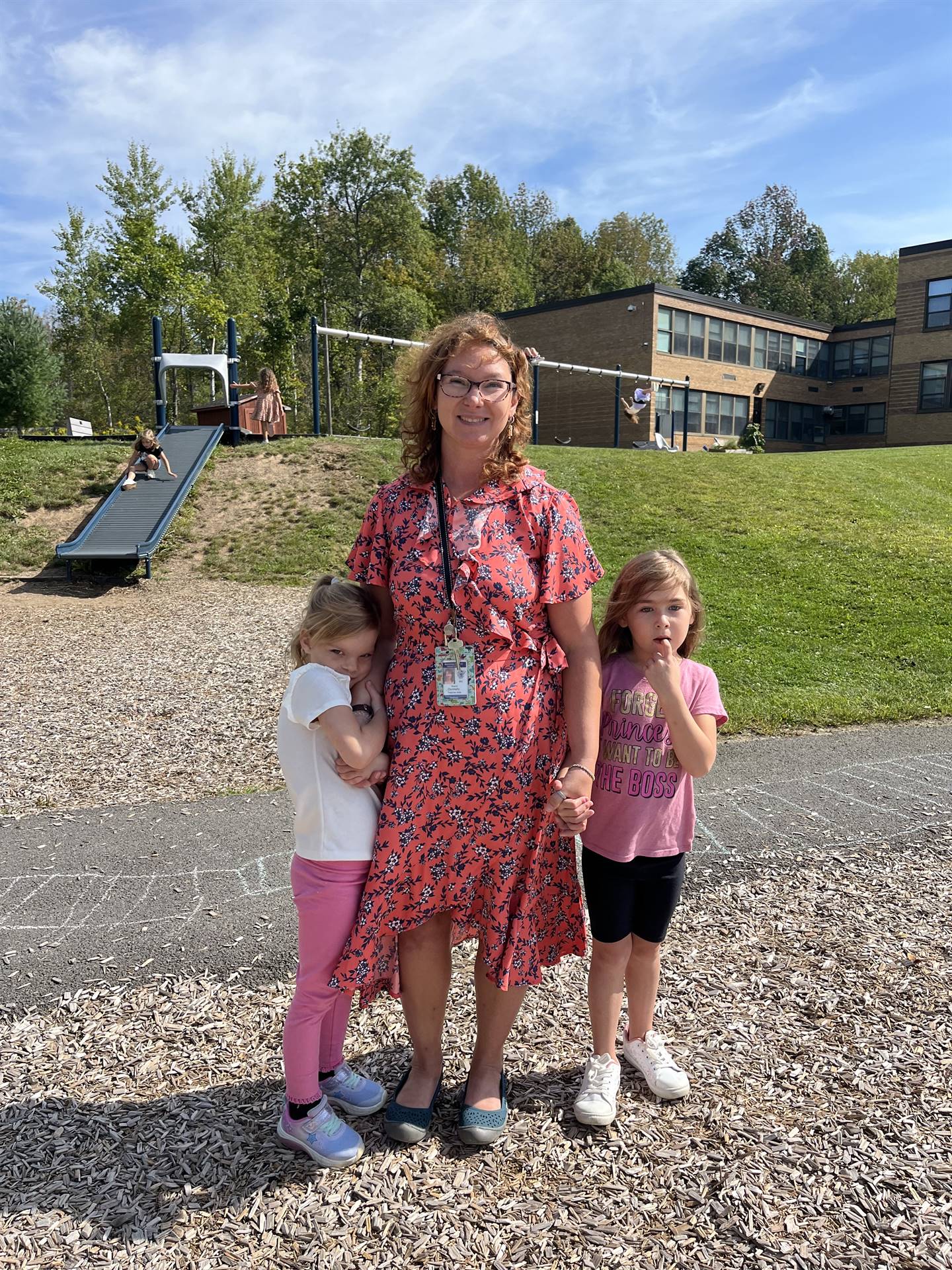 2 students with adult in middle