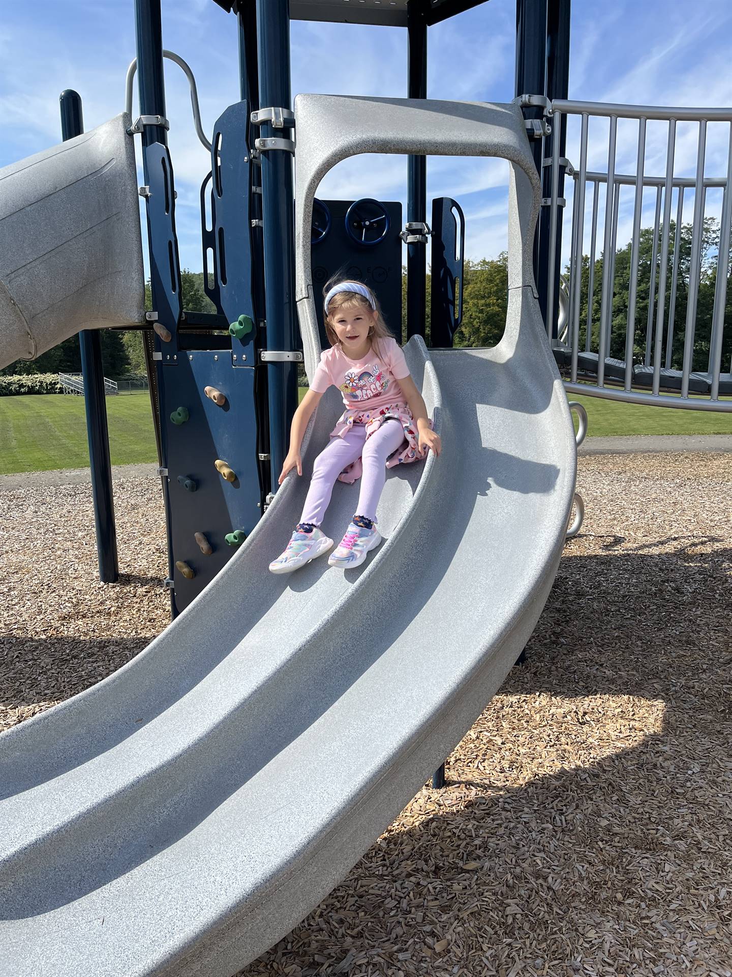 a student on a slide