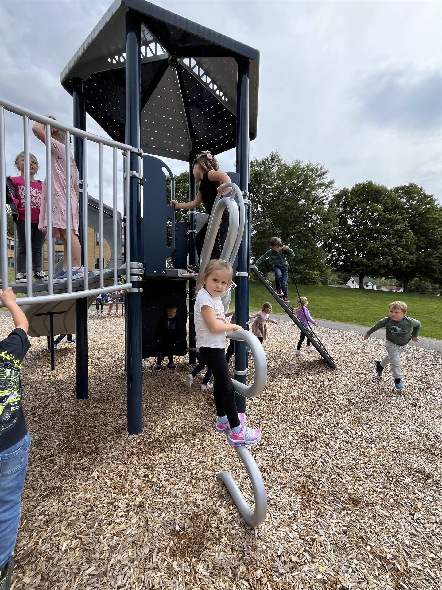 students on playground structure