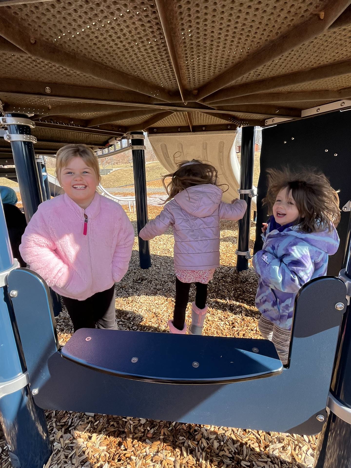 3 student on playground