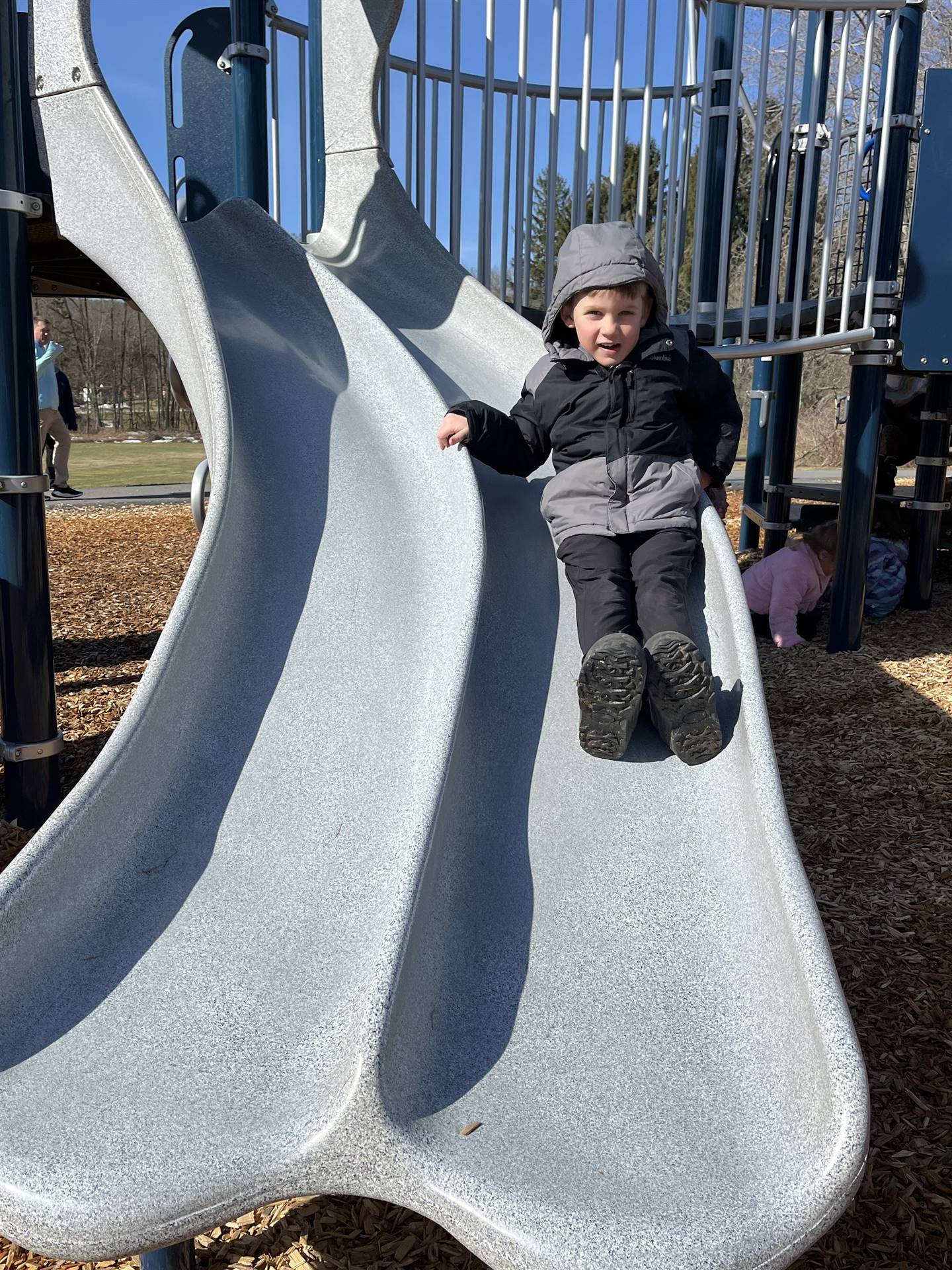 a student on a slide.